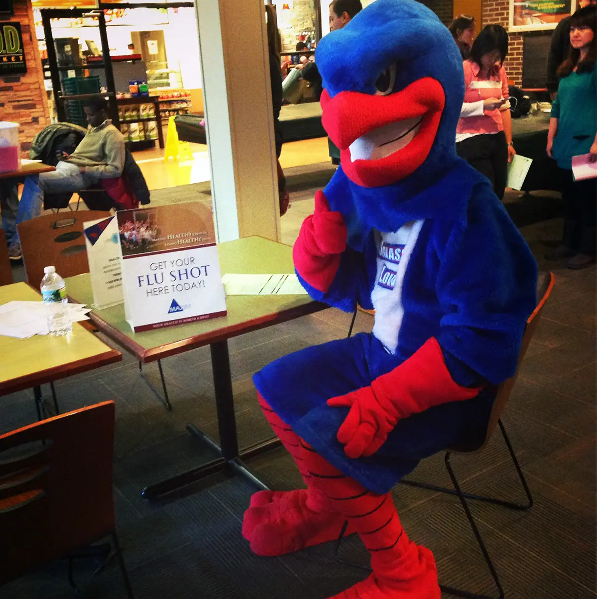 Rowdy gives a thumbs up while getting his flu shot.