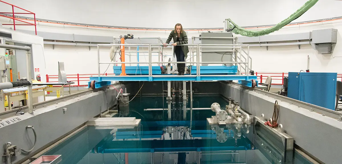 Chemical/Nuclear Engineering student working in reactor.