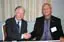 UMass Lowell Chancellor Marty Meehan, left, shakes hands with Ben-Gurion University Rector Zvi HaCohen at the signing of the memorandum of understanding that officially marks the start of a new partnership between the institutions.