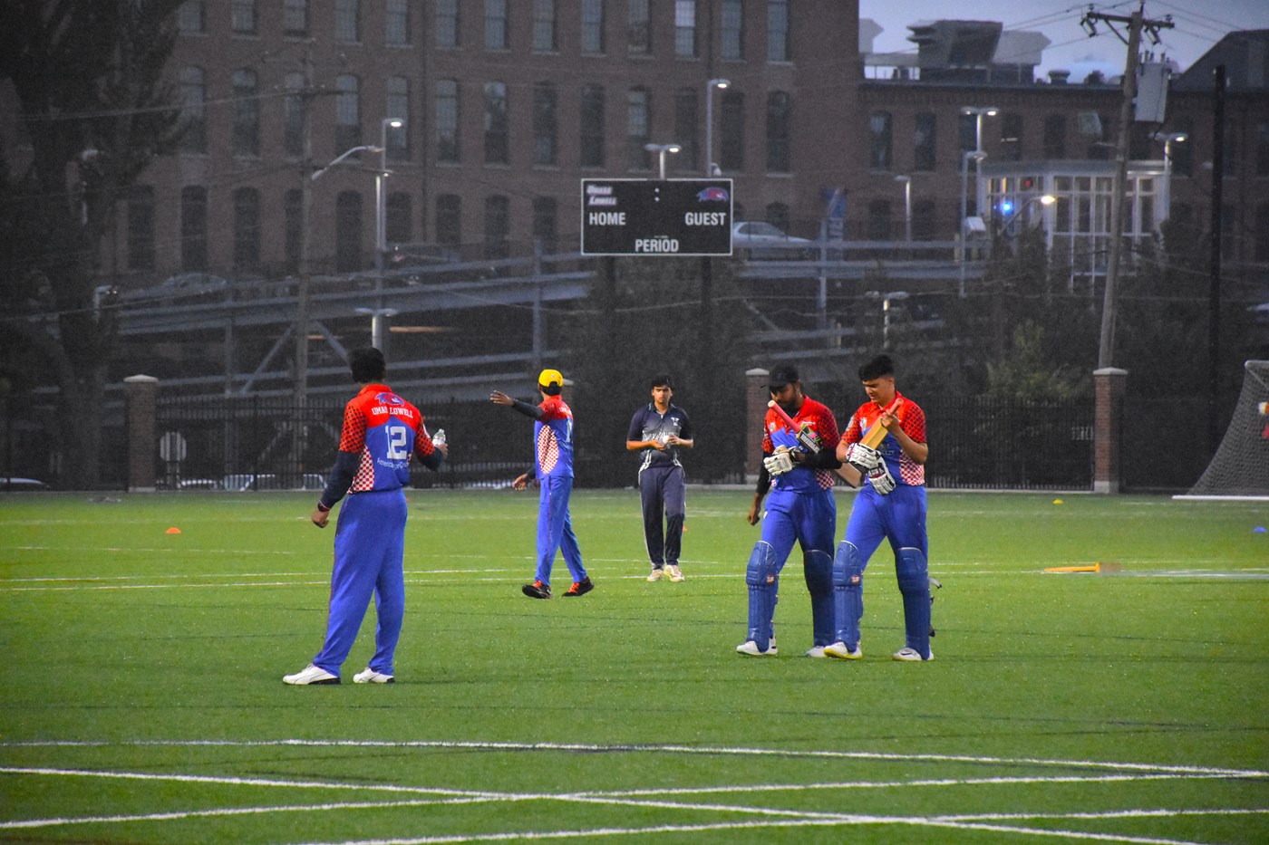 Cricket team taking the field during a match