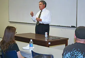 UMass President Robert Caret fields questions from chemistry students.