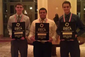 Business students Eric Howe, Ibrahim Lahlaf and Reynaldo Santana won first place in an international advertising competition.