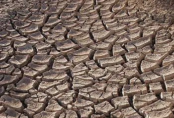 Parched, cracked earth is one of the telltale signs of below-normal precipitation.