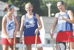 UMass Lowell field hockey teammates, from left, sophomore Kayla MacDonald of Chelmsford, senior Abby Auld of Waltham and junior Chelsea Gillies of Chelmsford don't appear to be feeling any pressure to repeat as nationals champions.&nbsp;
Lowell Sun Photo by Julia Malakie