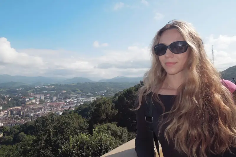 Jesse Friedman poses while traveling in San Sabastian, Spain on top of Mount Igueldo.
