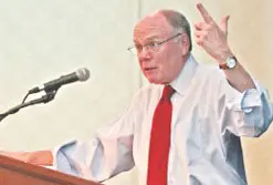 Karl Case, former Wellesley College professor of economics, speaks on the housing crisis during a luncheon at the UMass Lowell Inn & Conference yesterday.