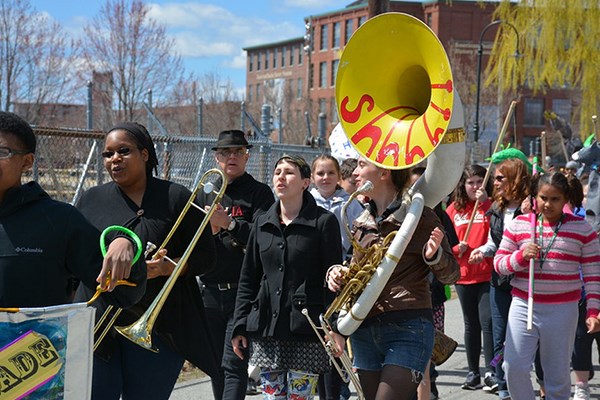 Students march in 2015 Lowell Earth Day Parade