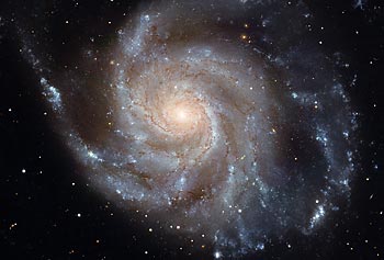 
      The face-on spiral galaxy M101 in Ursa Major, shown in this photo taken by the Hubble Space Telescope, is the target of Asst. Prof. Timothy Cook’s rocket experiment in November.
     