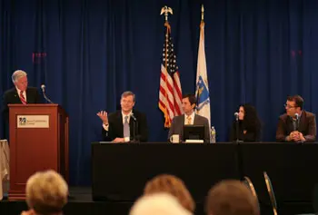 The panel, moderated by Chancellor Marty Meehan, far left, featured, &nbsp;from left, Charlie Baker, Joe Battenfeld, &nbsp;Jennifer Myers and Glen Johnson.