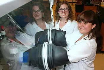 Plastics engineering Asst. Prof. Margaret Sobkowicz-Kline, left, and undergraduate student Fran Palacios working in the Polymer Science Lab.