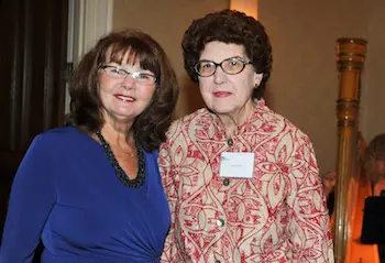 Current Nursing Department Chair Karen Devereaux Melillo, left, and former chair May Futrell celebrate the 40th anniversary of the program.