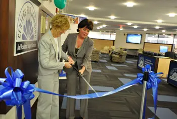 Retired Library Director Pat Noreau, left, who oversaw the transformation of O&rsquo;Leary Library into the O&rsquo;Leary Commons, and Sheila Riley-Callahan, executive director of academic services and special programs, cut the ribbon to officially open the facility.