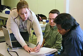 Music majors Maggie Dougherty and Mike McKendry work with computer science major Sophanna Son to figure out the best way to implement a composition program that reflects the way a musician thinks about the problem.