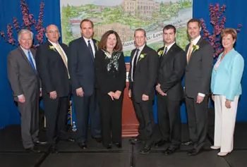 On the left, UMass Lowell Chancellor Marty Meehan and on the far right, Executive Vice Chancellor Jacqueline Moloney with 2012 University Alumni Award honorees James Regan, Robert LeFort, Linda FitzPatrick, Richard Miner, Michael Jarvis and Steven DiNoto.&nbsp;