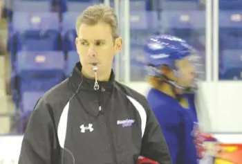 Norm Bazin runs a UMass Lowell River Hawks practice at Tsongas Center. Since a crash in November 2003 left him near death with a torn aorta, the first-year coach is happy to be back on the ice.&nbsp;
