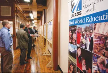 Visitors tour the 14,000-square-foot facility. Eight companies are calling the incubator home.