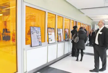 Participants of Tuesday's Middlesex 3 Coalition meeting got a chance to tour UMass Lowell's new Emerging Technologies Innovation Center, at the corner of University Avenue and the VFW Highway, after the meeting. Above is a look from outside a "clean room" used for photolithography processes.