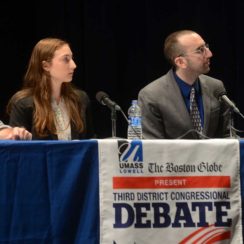 UMass Lowell political science student participates as a panelist in a debate among the Democratic primary candidates for Niki Tsongas’ seat in Congress