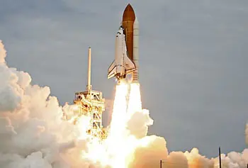 The space shuttle Atlantis blasted off into space on July 8 from the Kennedy Space Center in Cape Canaveral, Fla. This photo was captured by a homemade remote camera that was designed and built by UMass Lowell staffer Edwin Aguirre and his wife, Imelda Joson, and Asst. Prof. Joel Therrien.