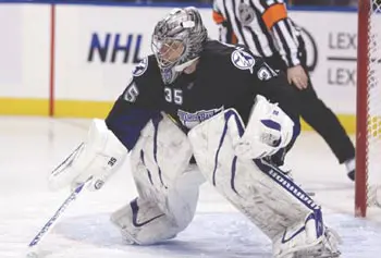 Former UMass Lowell goaltending great Dwayne Roloson is helping out with the River Hawk goalies while the NHL lockout continues.