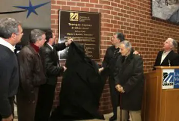 UMass Lowell Chancellor Marty Meehan, far right, thanks Lowell state lawmakers who helped pass enabling legislation to transfer ownership of what is now the Tsongas Center at UMass Lowell from the city to the university. Unveiling the plaque, from left, are City Manager Bernie Lynch, state Reps. Tom Golden and Dave Nangle, former State Sen. Steve Panagiotakos with his father William Panagiotakos of Lowell, and Meehan. State Rep. Kevin Murphy was out of town and unable to attend the ceremony.