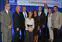 Honorees gather at the Commencement Eve celebration, which raised a record-breaking $725,000 for scholarships, from left: Bernie Shapiro ’56; Chancellor Marty Meehan; Bill Mucica, brother of Gary Mucica, and Sally Mucica, wife of Gary Mucica;  Mark ’81 and Elisia Saab; Edward Davis; Nancy L. Donahue; and Harish Hande ’98, ’00.