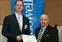 Rep. James Miceli , right, recognizes Assoc. Prof. Daniel Schmidt with the “University Research Champion” award for researching safer alternatives to toxic chemicals with seed funding from TURI.