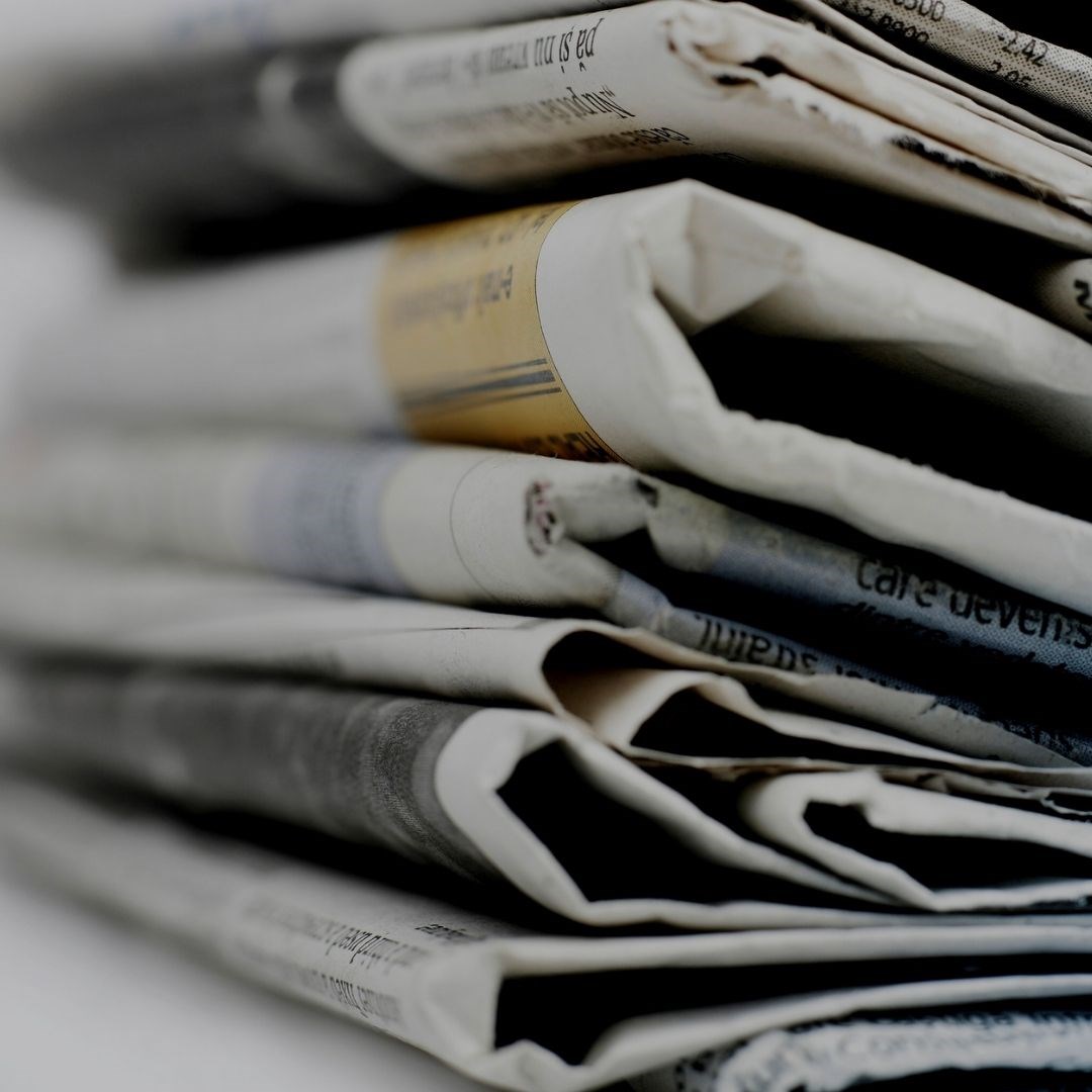 Stack of newspapers.