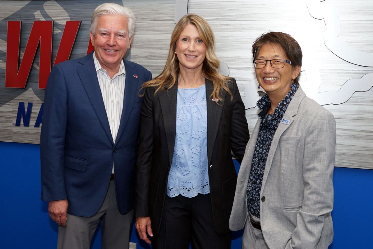 UMass President Marty Meehan, UMass Lowell Atheletic Director Lynn Coutts and UMass Lowell Chancellor Julie Chen