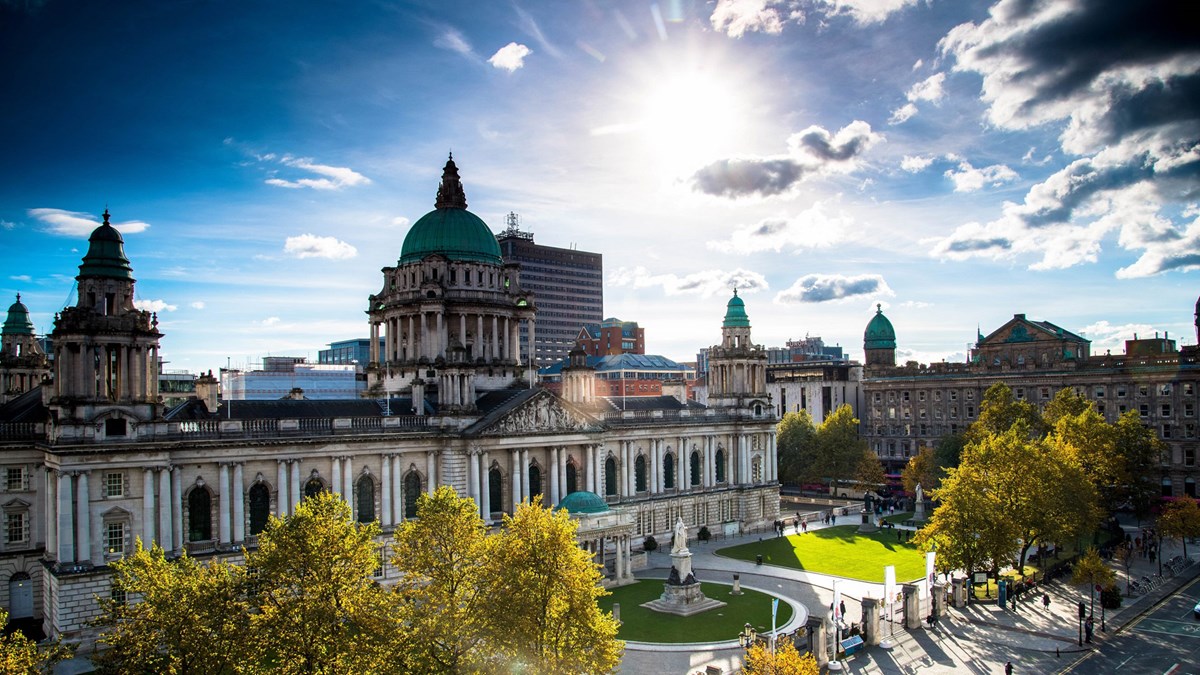 Belfast City Hall Building with trees in front.