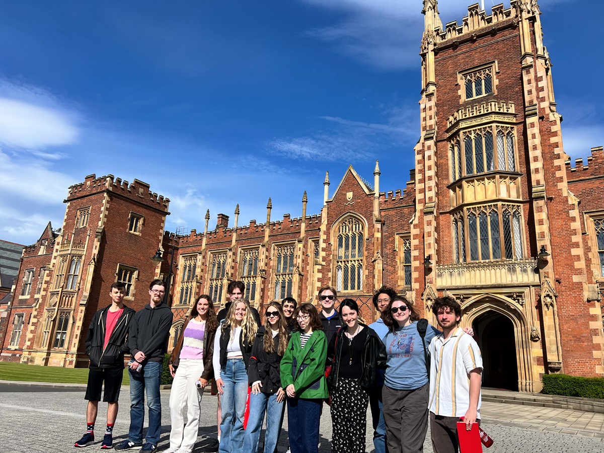 Students standing in front of building in Belfast