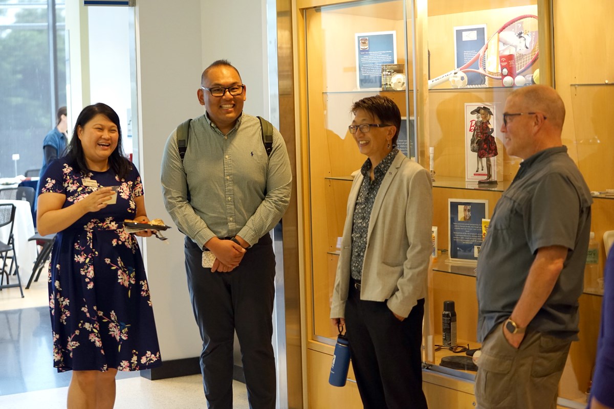 UMentor 2024 Faculty Leads Yanfen Li and Mark Hsu, mentors with UMass Lowell Chancellor Julie Chen.