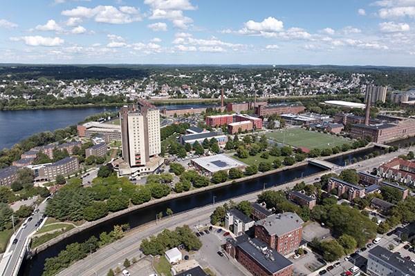 Aerial photograph of UMass Lowell featuring East Campus and the river.