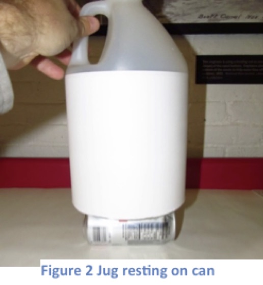 Figure 2 Jug resting on can