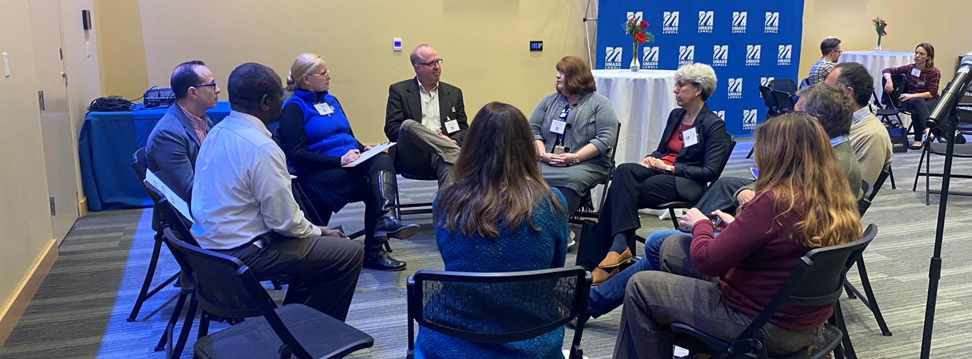 UMass Lowell Faculty discussing equity at symposium.