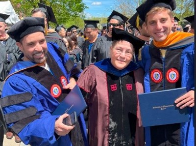 CMINDS PhD students John DiZoglio and Othmane Habbouli were hooded by their Thesis Advisor Dr. Megherbi