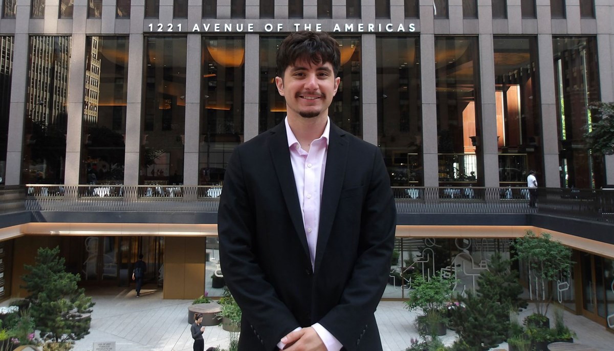 Matthew Almeida in front of 1221 Avenue fo the Americas Business Center in New York.   