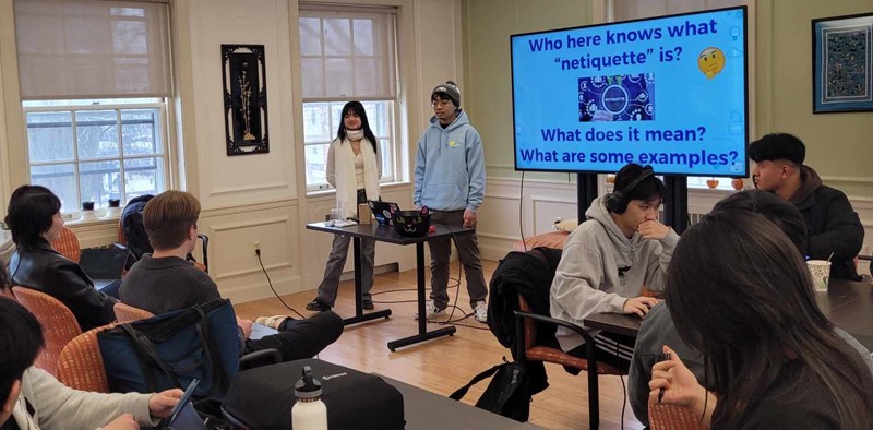 Group of Students attending a event about netiquette