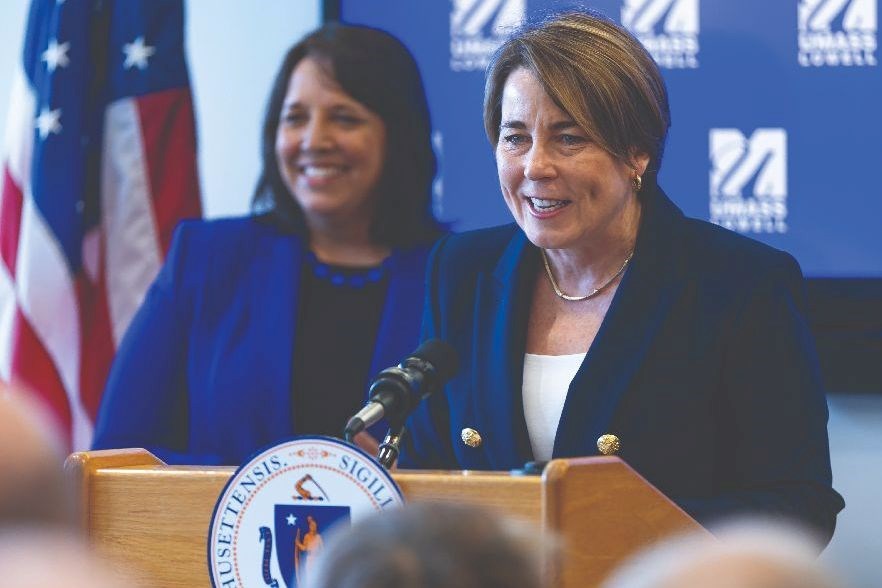 Gov. Maura Healey at the podium with Lt. Gov. Kim Driscoll in background