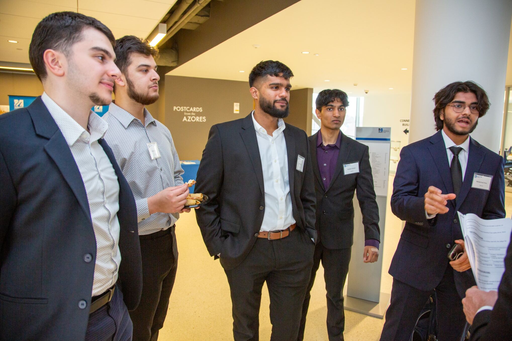 Team BeanHub networking with a mentor at the 2024 $50,000 Idea Challenge.