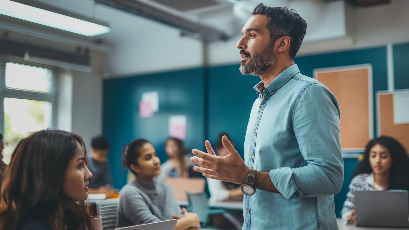 Man standing in front of classroom speaking