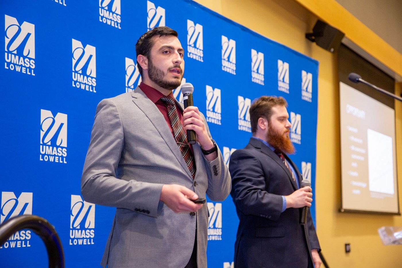 Team Socket Tech Solutions pitching an idea to an audience and judges at the $50,000 Idea Challenge.